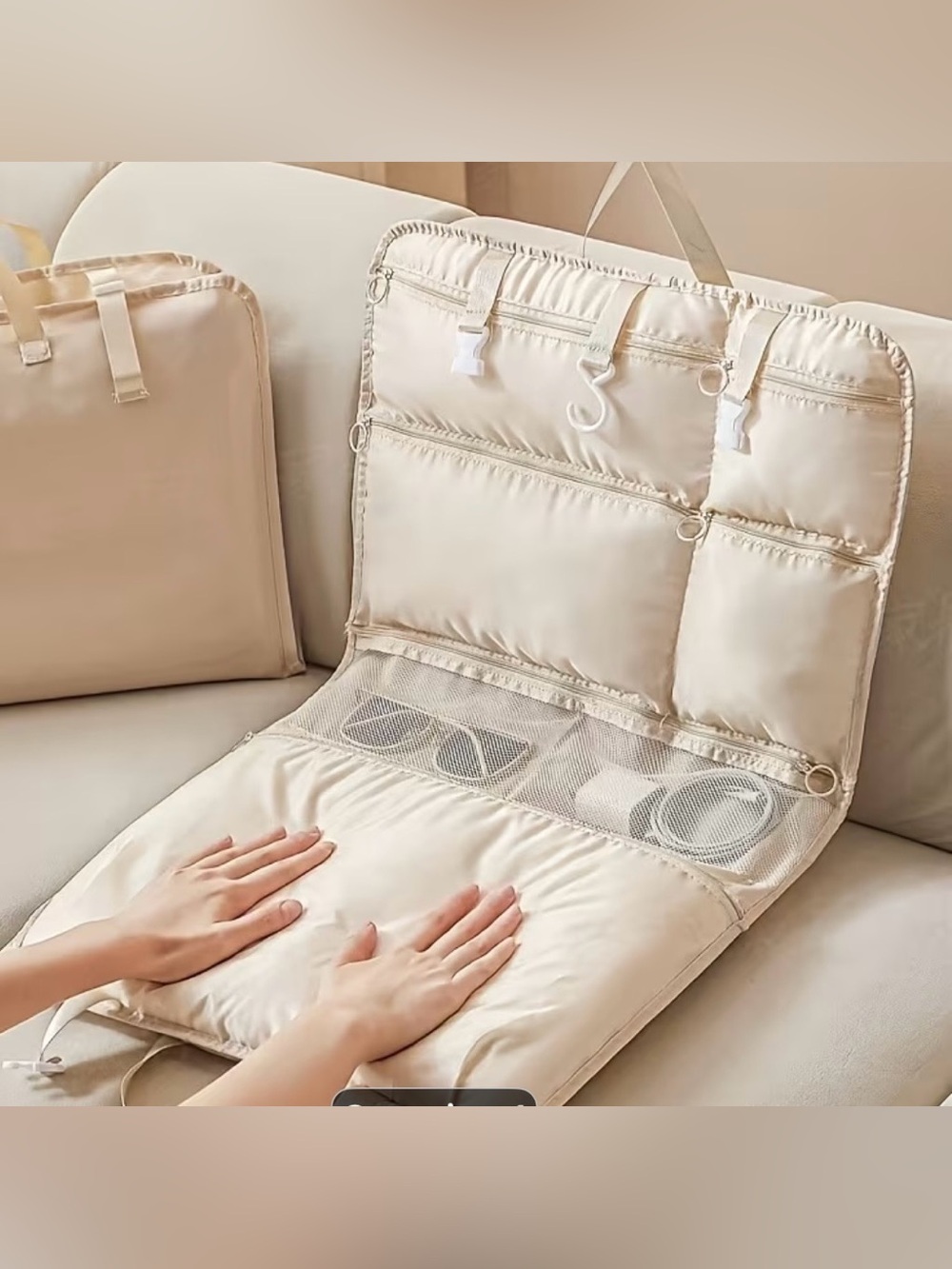 Beige Hanging Organizer with Multiple Pockets and Hooks